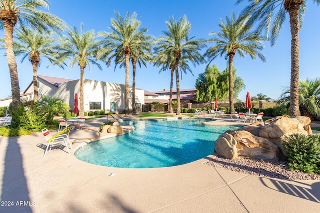 4548 E Carob Dr, Gilbert, AZ 85298 - community pool with a patio
