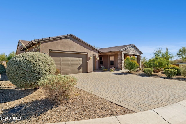 ranch-style home with a garage