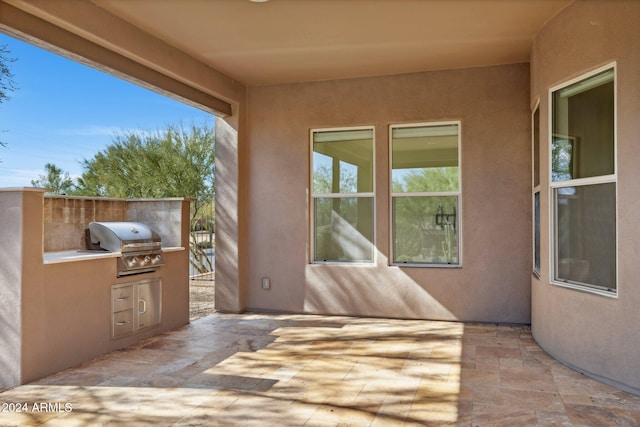 view of patio with grilling area and exterior kitchen