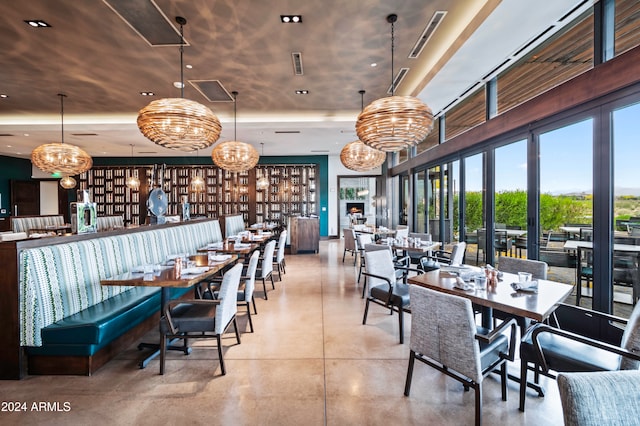 dining area featuring concrete flooring