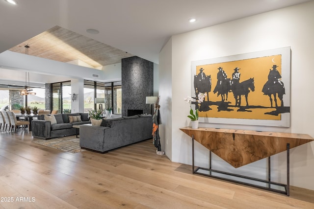 living room with light hardwood / wood-style flooring