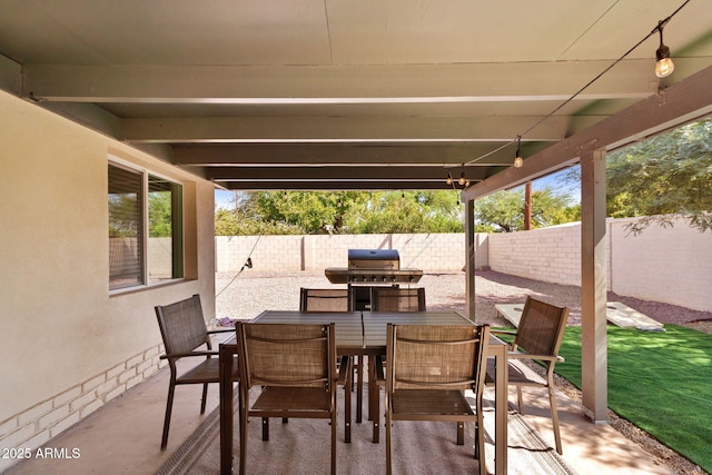 5833 N 10th St, Phoenix, AZ 85014 - fenced backyard featuring a patio area and outdoor dining area