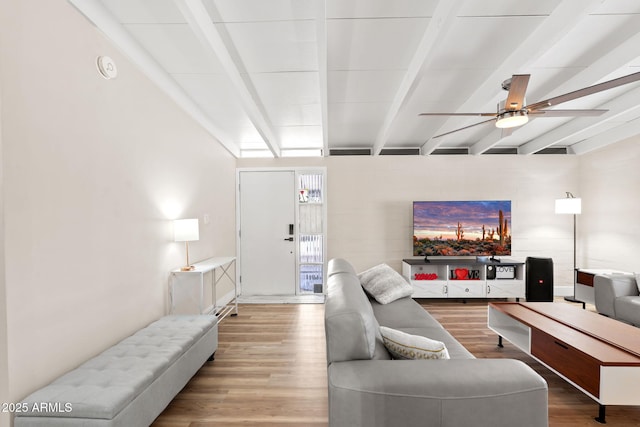 5833 N 10th St, Phoenix, AZ 85014 - living area with beam ceiling, wood finished floors, and ceiling fan