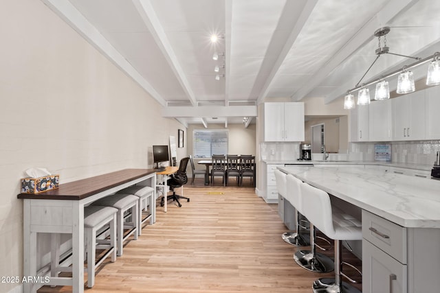 5833 N 10th St, Phoenix, AZ 85014 - office space featuring light wood-type flooring and beam ceiling