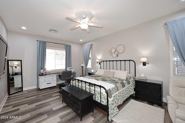 bedroom featuring ceiling fan and hardwood / wood-style floors