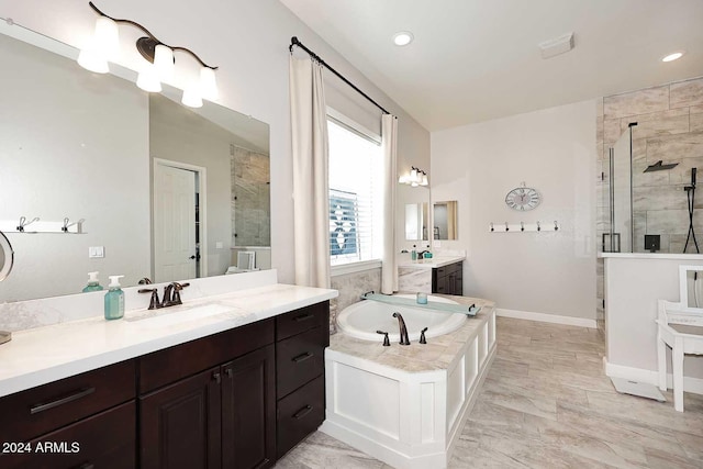 bathroom with vanity and plus walk in shower