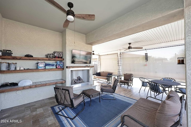 view of patio / terrace featuring ceiling fan