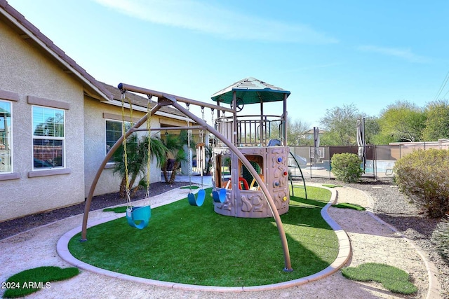 view of play area with a yard