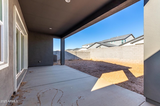 view of patio with central AC