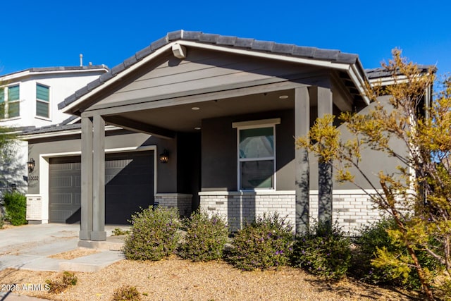 view of front of home featuring a garage