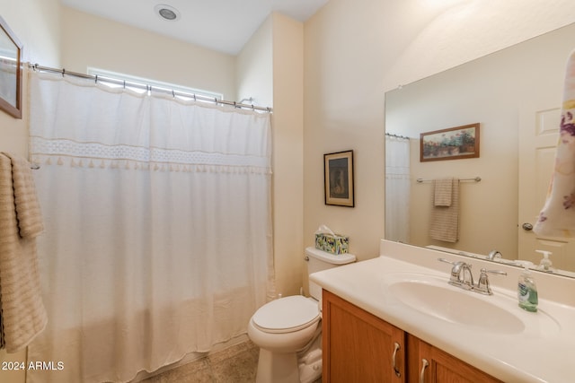 bathroom with vanity, tile patterned flooring, toilet, and a shower with shower curtain