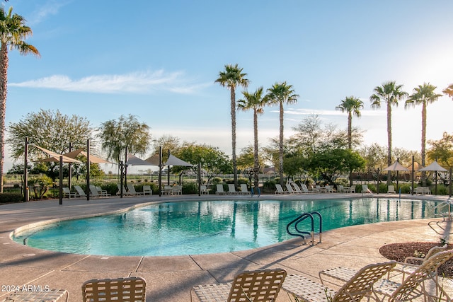 pool with a patio