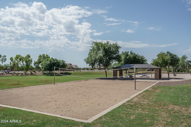 view of home's community with volleyball court, a lawn, and a gazebo