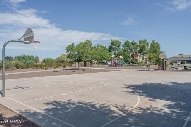 view of basketball court with community basketball court and playground community