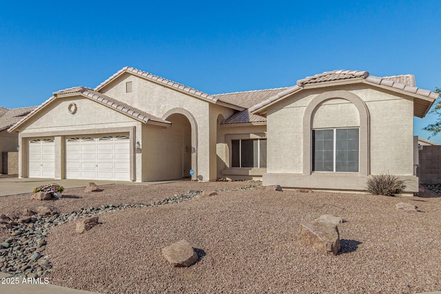 view of front of home with a garage