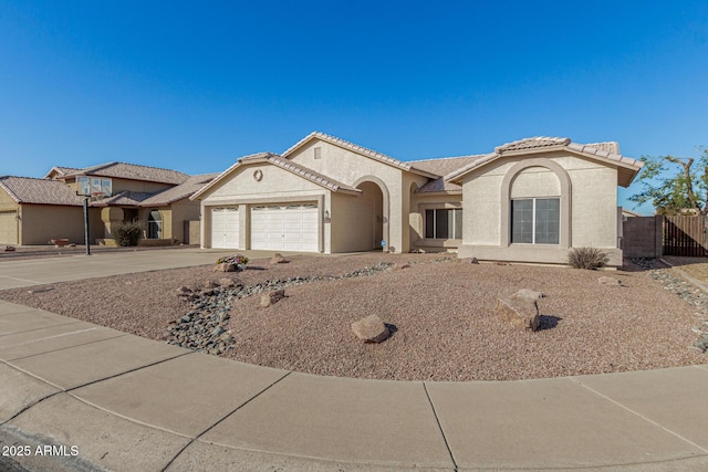 view of front of property with a garage