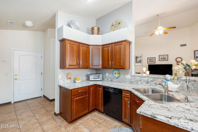 630 W Cattle Drive Trl, Flagstaff, AZ 86005 - kitchen featuring brown cabinetry, dishwasher, a sink, and a ceiling fan