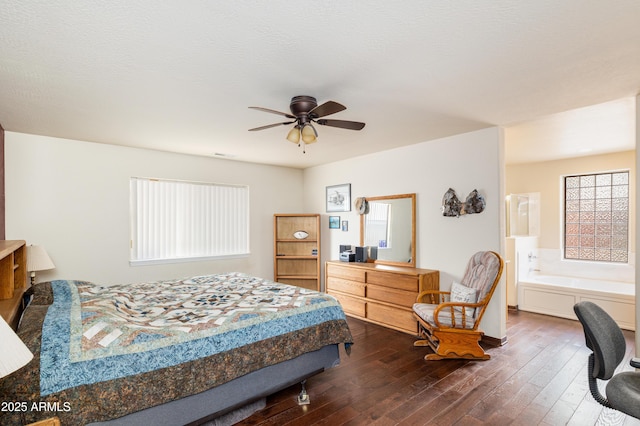 630 W Cattle Drive Trl, Flagstaff, AZ 86005 - bedroom featuring dark wood-type flooring, visible vents, ceiling fan, and multiple windows