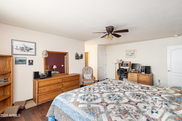 630 W Cattle Drive Trl, Flagstaff, AZ 86005 - bedroom featuring dark wood-type flooring, a textured ceiling, and ceiling fan