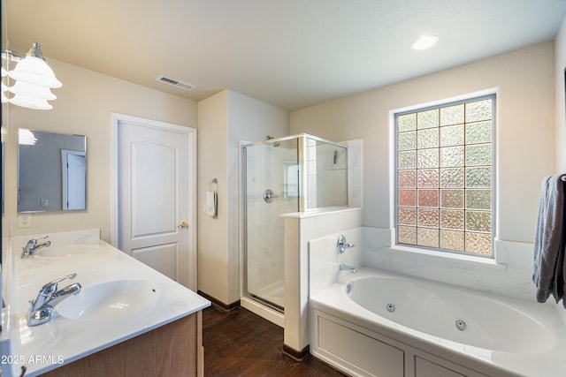 630 W Cattle Drive Trl, Flagstaff, AZ 86005 - bathroom with a sink, visible vents, a stall shower, and a healthy amount of sunlight