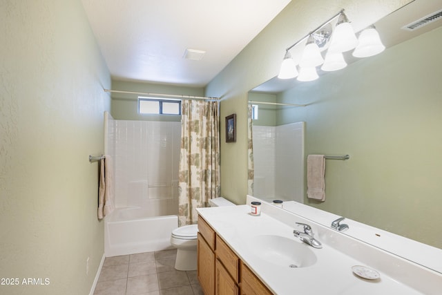 630 W Cattle Drive Trl, Flagstaff, AZ 86005 - full bathroom featuring visible vents, shower / tub combo, toilet, vanity, and tile patterned flooring