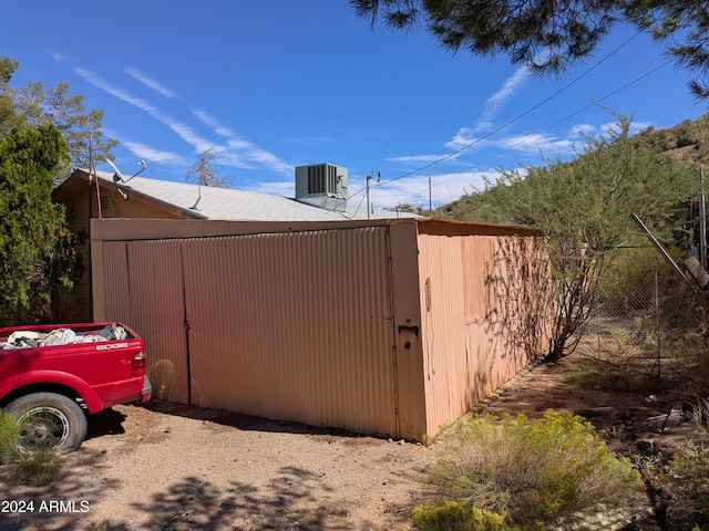 view of outbuilding with cooling unit