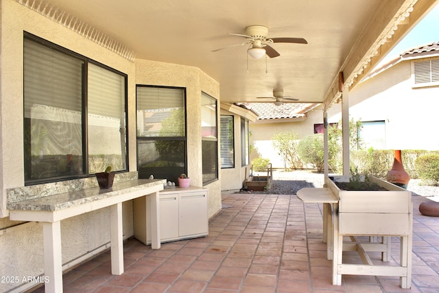 view of patio with a ceiling fan