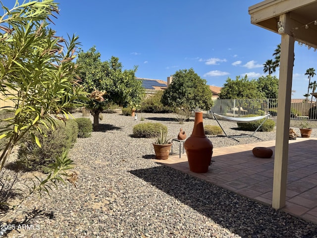 view of yard with a patio area and fence