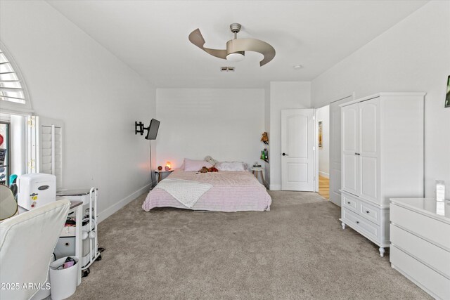 10415 E Rosemary Ln, Scottsdale, AZ 85255 - bedroom with light colored carpet, ceiling fan, and baseboards