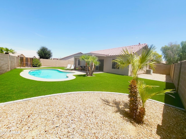 view of pool with a fenced backyard, central AC unit, a fenced in pool, and a patio