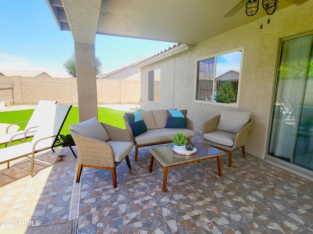 view of patio / terrace featuring fence and an outdoor living space