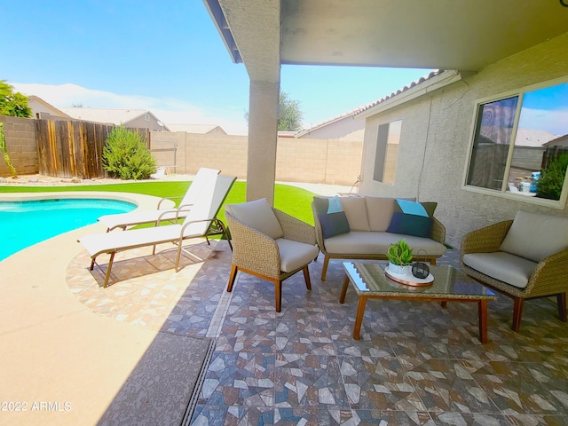 view of pool with a fenced in pool, a fenced backyard, and a patio