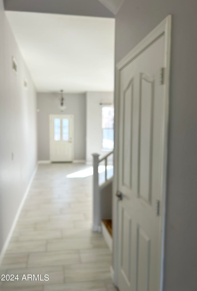 hallway featuring light hardwood / wood-style floors