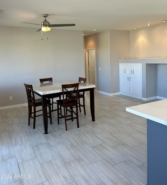 dining room with ceiling fan