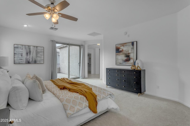 bedroom featuring carpet flooring, visible vents, and access to exterior