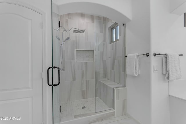 bathroom with a stall shower