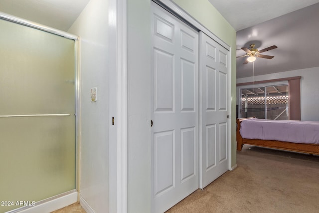 carpeted bedroom featuring ceiling fan