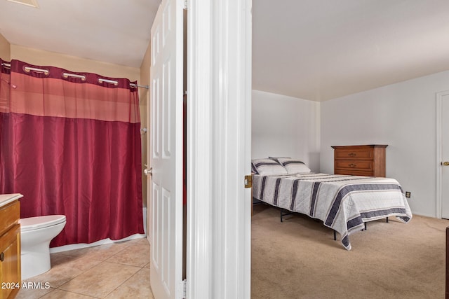 bedroom with light colored carpet