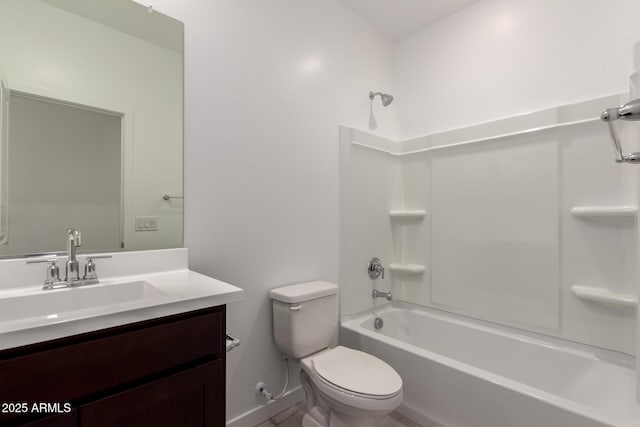 full bathroom featuring shower / tub combination, toilet, vanity, and baseboards