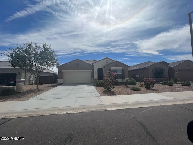 single story home featuring a garage