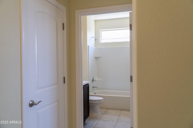 full bathroom featuring tile patterned floors, toilet, shower / bathing tub combination, and vanity