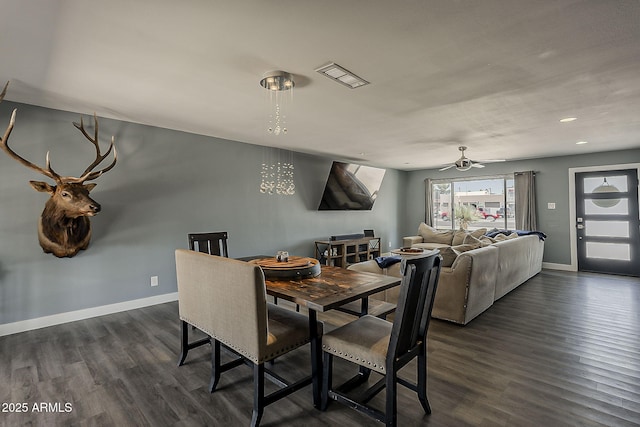 8137 E Indian School Rd, Scottsdale, AZ 85251 - dining area with dark wood-type flooring, a ceiling fan, and recessed lighting
