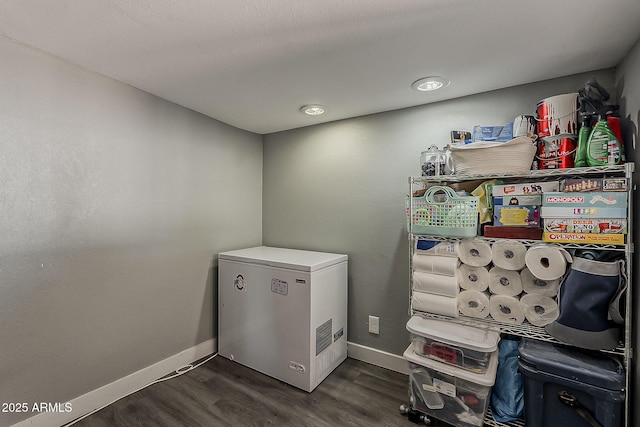 8137 E Indian School Rd, Scottsdale, AZ 85251 - laundry room with baseboards and dark wood-style floors