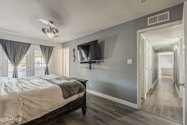 8137 E Indian School Rd, Scottsdale, AZ 85251 - bedroom with access to outside, wood finished floors, and ceiling fan