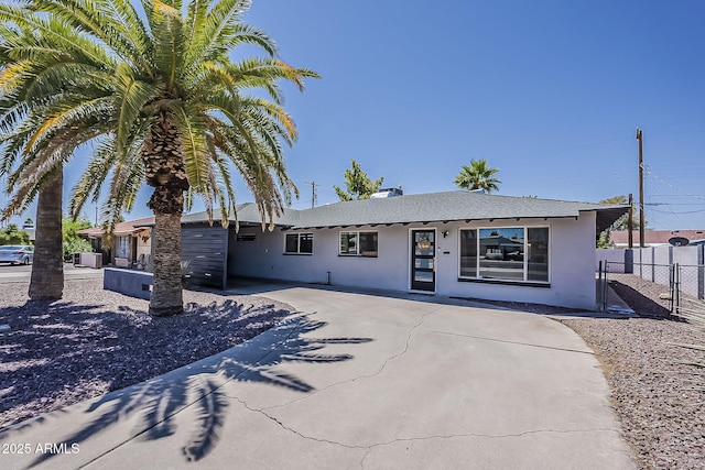 8137 E Indian School Rd, Scottsdale, AZ 85251 - single story home featuring stucco siding and roof with shingles