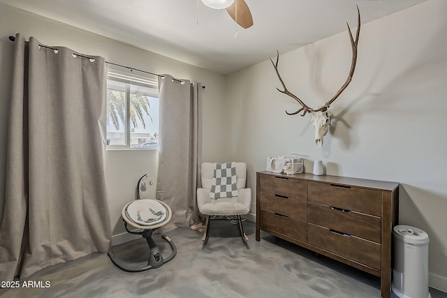 8137 E Indian School Rd, Scottsdale, AZ 85251 - living area with a ceiling fan and concrete flooring
