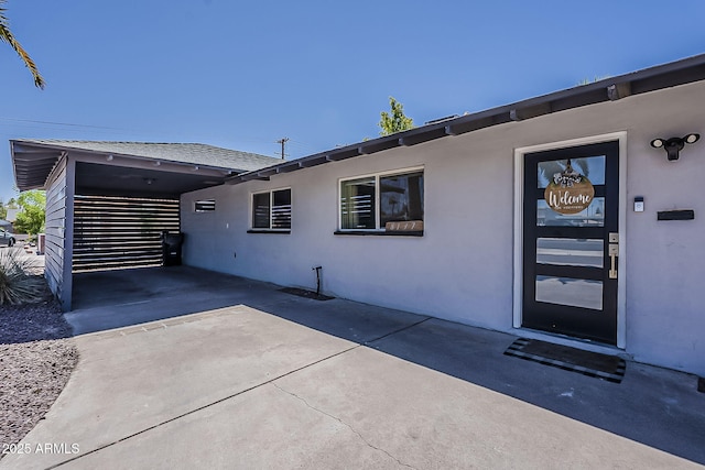 8137 E Indian School Rd, Scottsdale, AZ 85251 - view of front of home featuring stucco siding