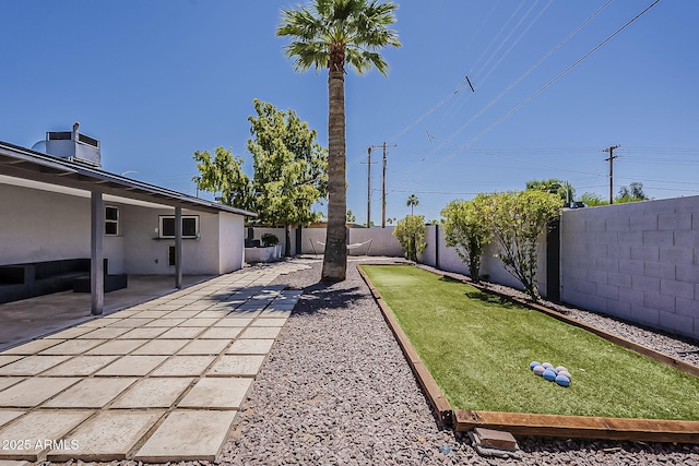 8137 E Indian School Rd, Scottsdale, AZ 85251 - fenced backyard featuring a game area and a patio