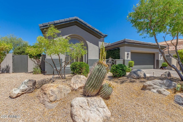 view of front of property with a garage