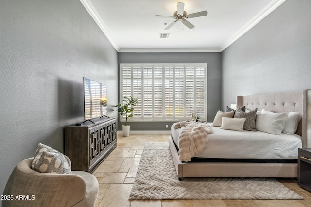 bedroom with ornamental molding and ceiling fan